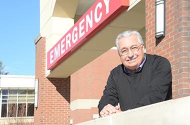Terry White in front of ER entrance